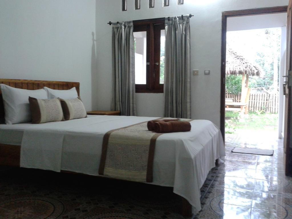 Putri Homestay Гілі-Мено Номер фото