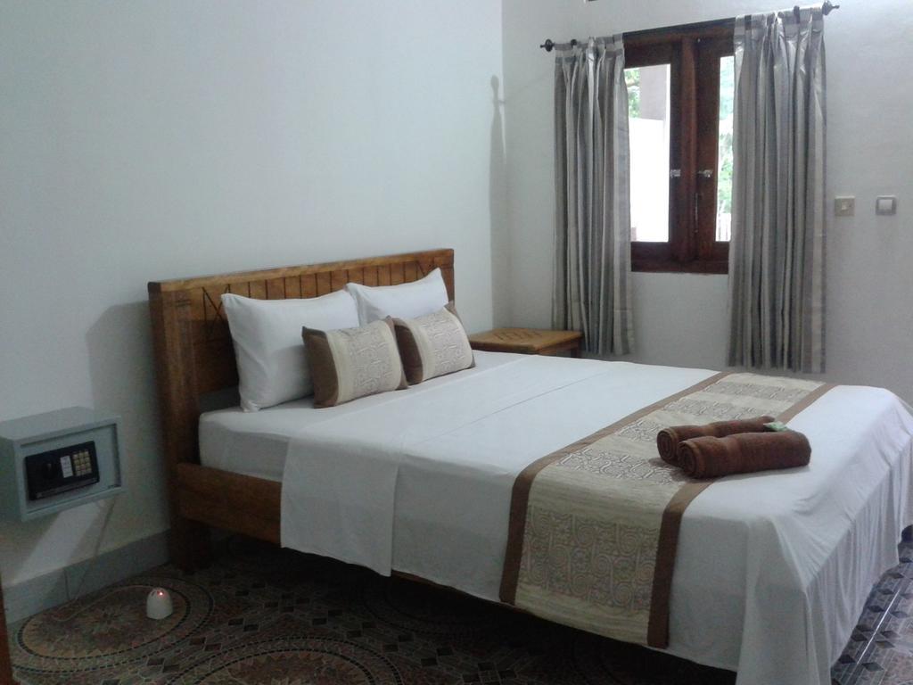 Putri Homestay Гілі-Мено Номер фото