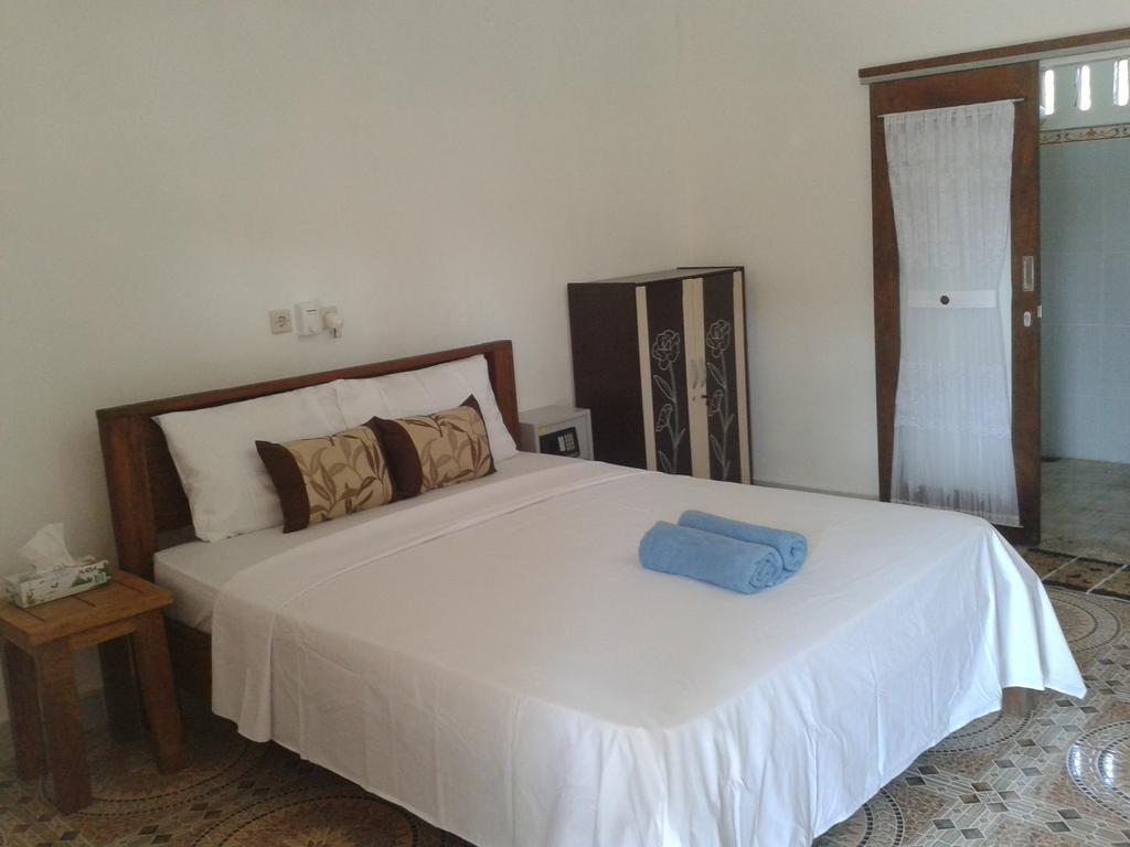 Putri Homestay Гілі-Мено Номер фото