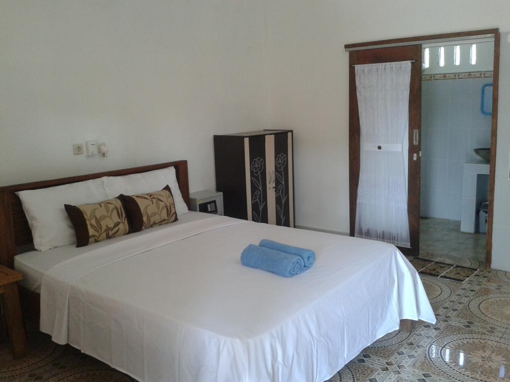 Putri Homestay Гілі-Мено Номер фото